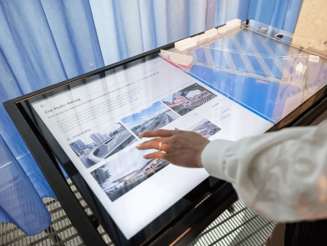 Visitor using an interactive urban design table